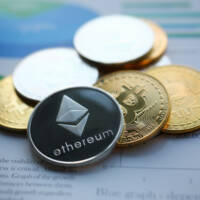 Silver ethereum jn chart paper closeup. Hard fork news consept